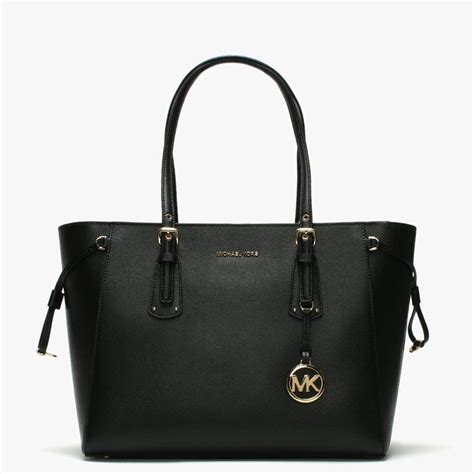 michael kors purse black tote|michael kors black bag.